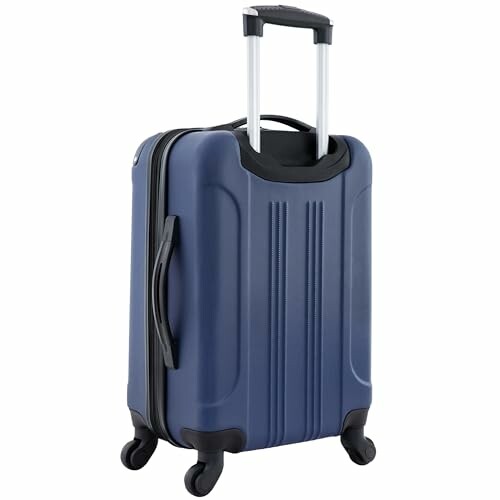 Blue rolling suitcase with handle extended