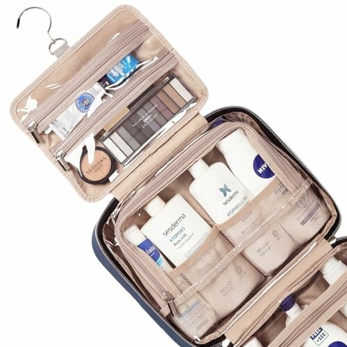 Open travel toiletry bag with various personal care items and cosmetics.